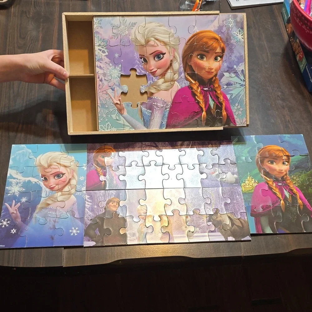5 Disney Frozen Puzzles in Wooden Storage Bin